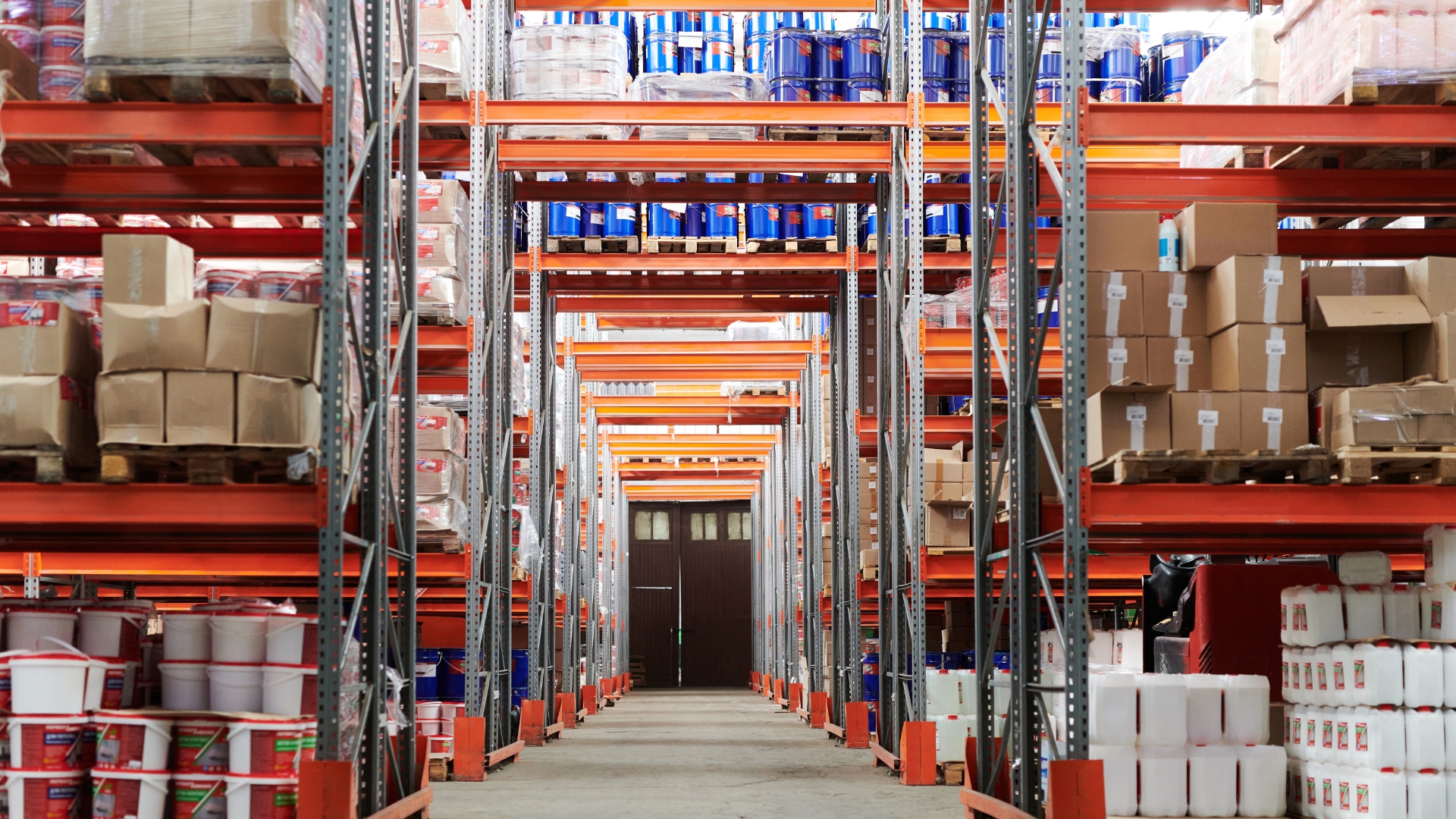 A large warehouse filled with lots of shelves and boxes